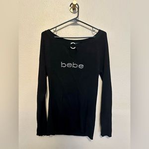 Bebe long sleeve blouse with rhinestone logo